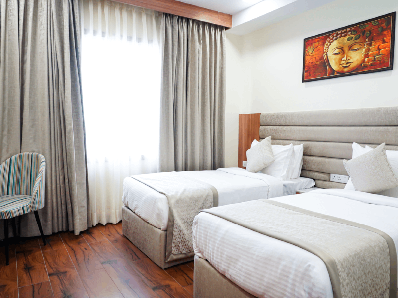 Suave Twin Bed Room